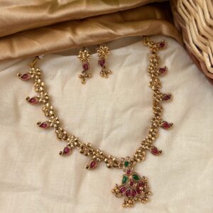 Temple Floral Pendant Necklace Set with Ruby & Emerald Stones – Traditional Jewellery at ₹399